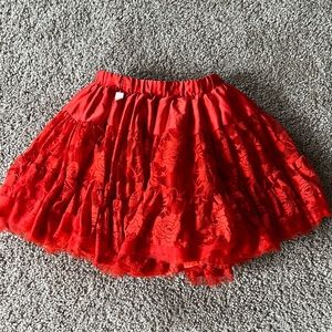 Cute red Disney skirt. Adorable on! Pair it with a tank or tee!